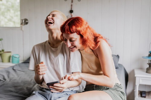 Friends sharing a laugh and being present