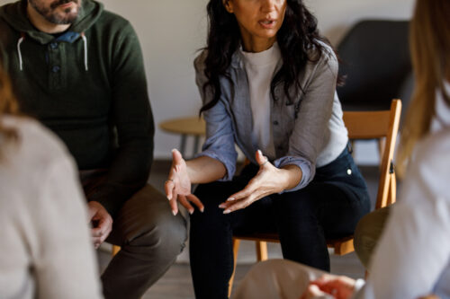 Woman explaining her divorce in her support group
