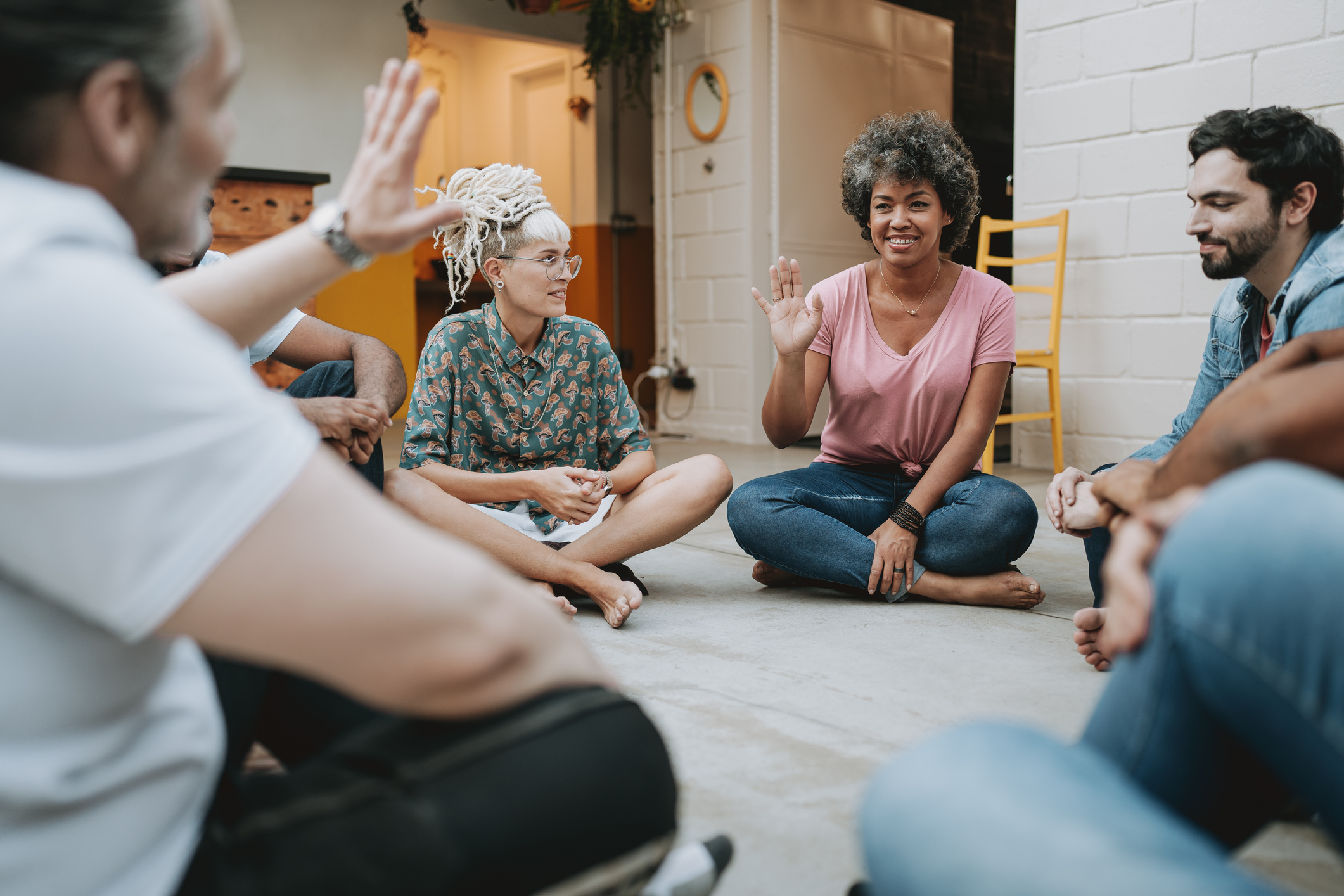 Individuals feeling elated after joining a support group and sharing their experiences.