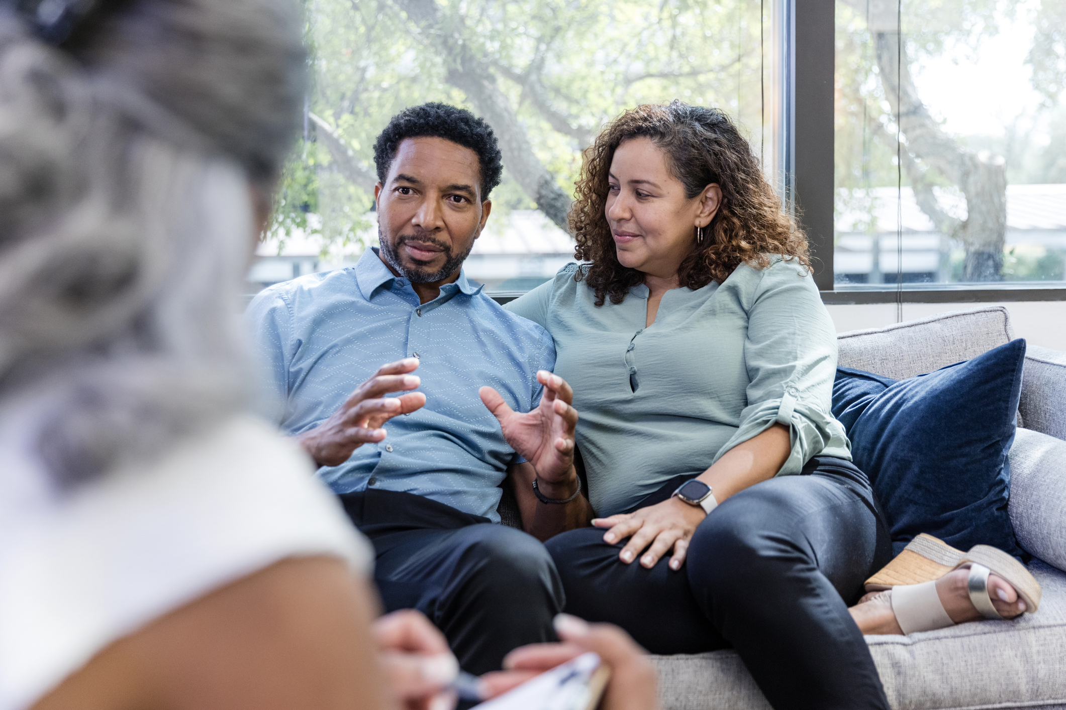 Couple in therapy together talking through their attachment styles.