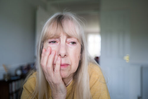 Woman feeling stressed and acting out.