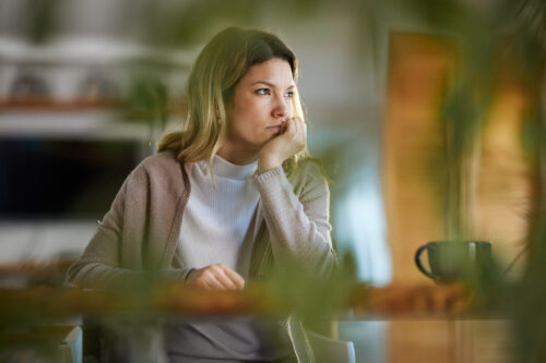 Young woman taking a break from the emotional toll of her thoughts