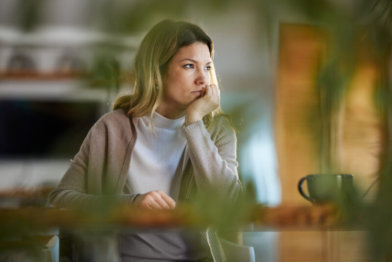 Young woman taking a break from the emotional toll of her thoughts