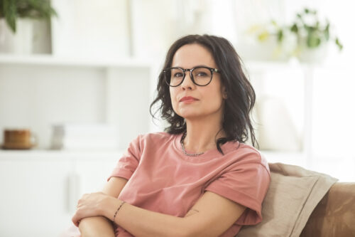 Older woman realizing she had PMDD her whole life.