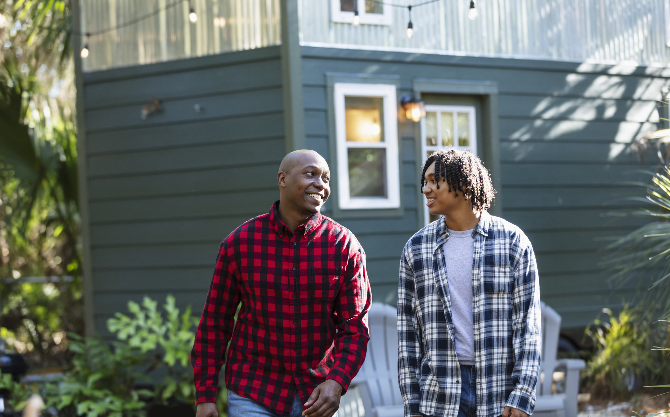 Teen walking with a parent outdoors, highlighting family relationships and strategies for coping with a narcissistic parent.