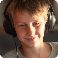 Portrait of Alex, an 11-year-old Charlie Health client