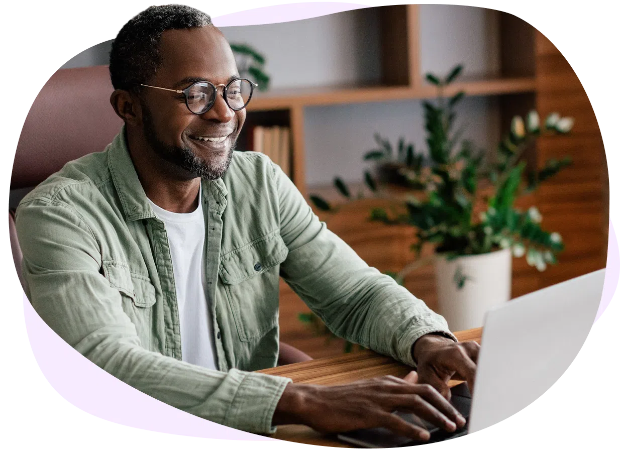 Man typing on a laptop