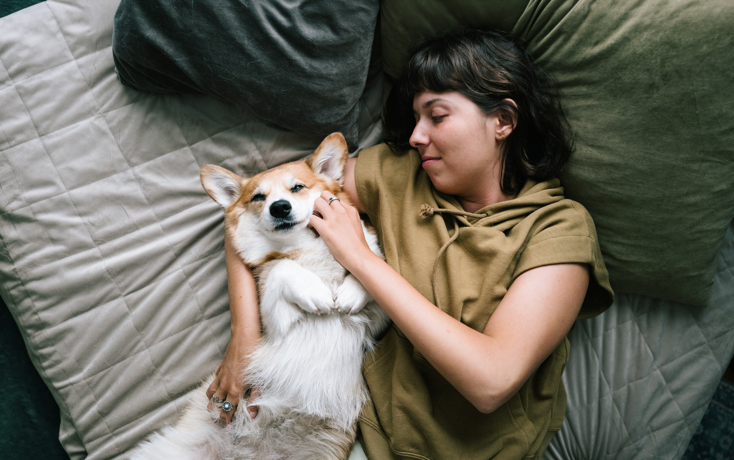 Person resting with a dog
